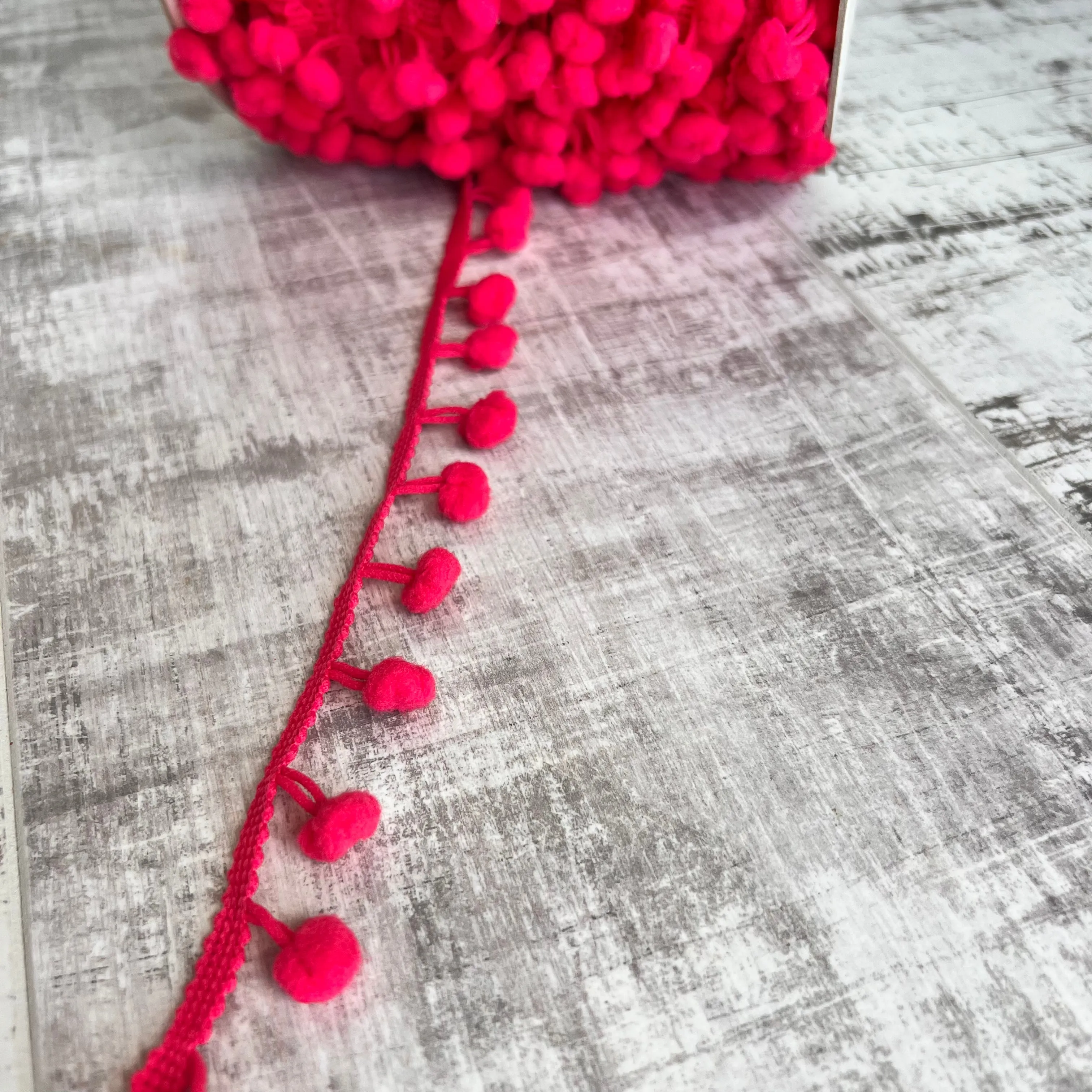 Vibrant Pink Pom Pom Trim (small 10mm) per metre